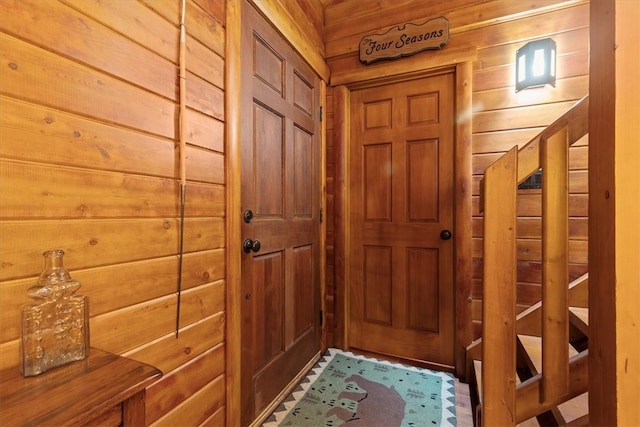 interior space featuring wood walls