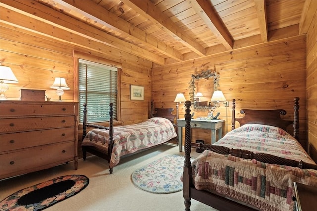 bedroom with wood ceiling, carpet floors, wooden walls, and beam ceiling