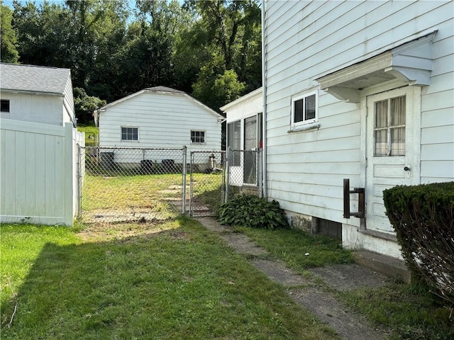 view of yard with a gate and fence