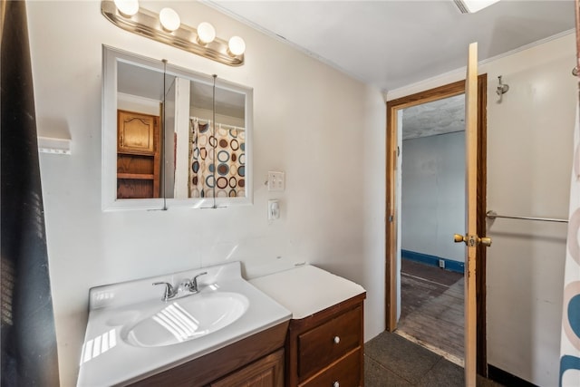 bathroom featuring hardwood / wood-style floors and vanity