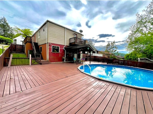 201 Esther Ave, New Kensington, PA 15068 - view of swimming pool featuring a fenced backyard, a deck, and stairway