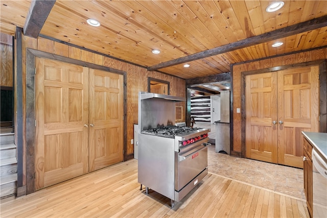 kitchen with premium range, wooden ceiling, wood walls, and light wood-type flooring