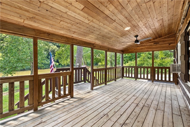 wooden deck featuring ceiling fan