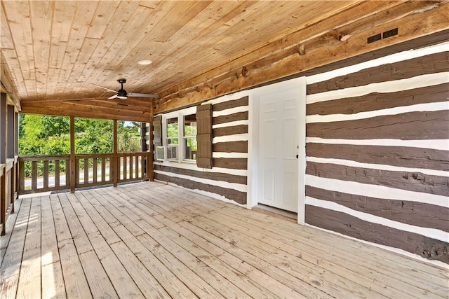 wooden deck with ceiling fan