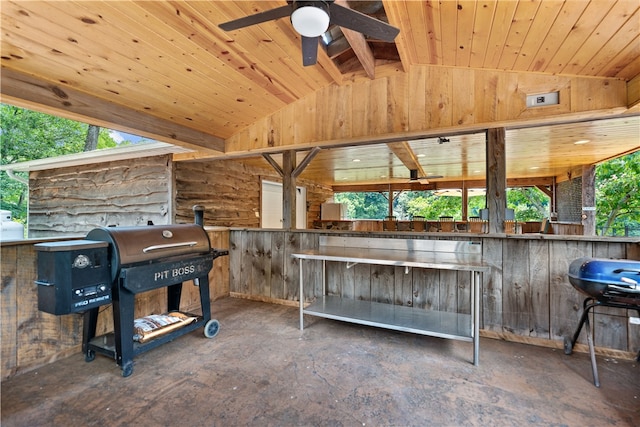 misc room with ceiling fan, wooden ceiling, and lofted ceiling