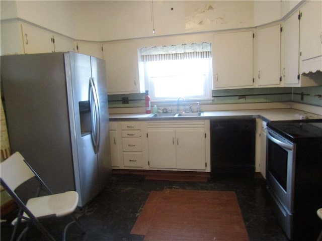 kitchen with sink, stainless steel appliances, and white cabinets