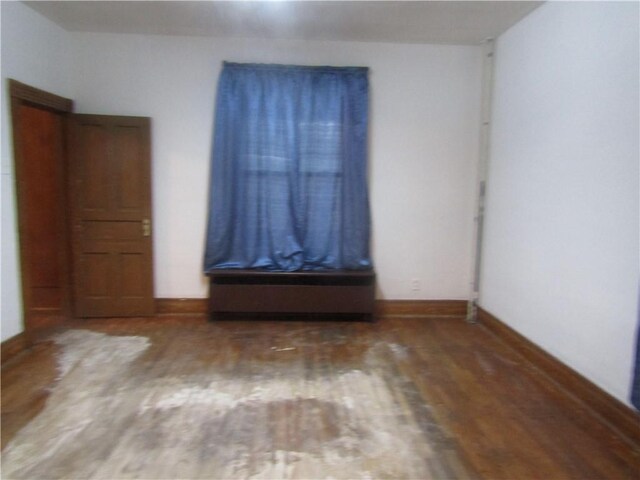 113 E Church Ave, Masontown, PA 15425 - spare room featuring wood finished floors and baseboards