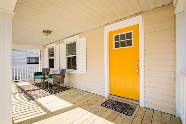 entrance to property with a porch