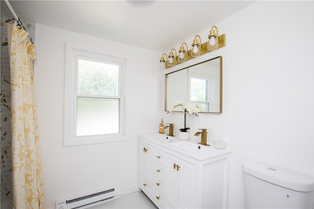 bathroom featuring a shower with curtain, vanity, a baseboard heating unit, and toilet