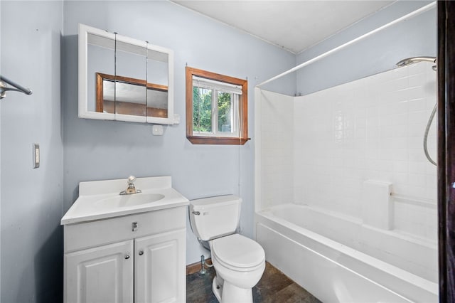 full bathroom with tile patterned floors, toilet, bathing tub / shower combination, and vanity