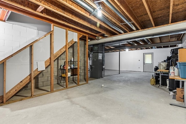 basement featuring heating unit