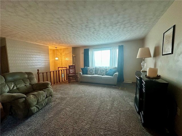 living room with carpet flooring and a textured ceiling