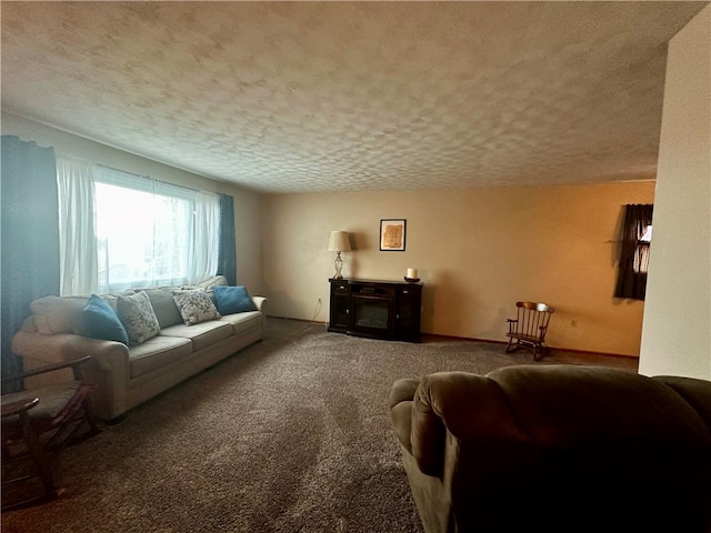 living room featuring carpet and a textured ceiling