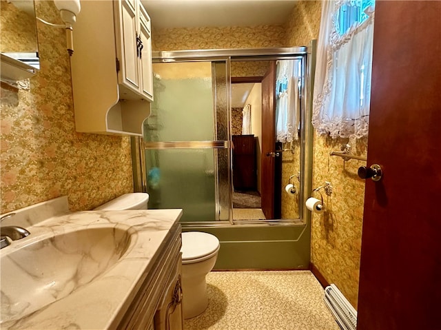 full bathroom with shower / bath combination with glass door, toilet, and vanity