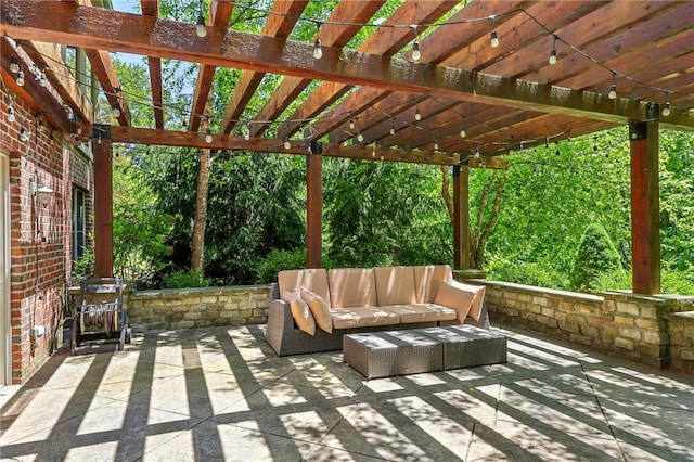 view of patio / terrace featuring a pergola and an outdoor hangout area