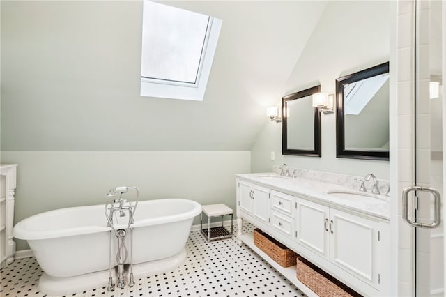 bathroom with vanity, lofted ceiling with skylight, and independent shower and bath