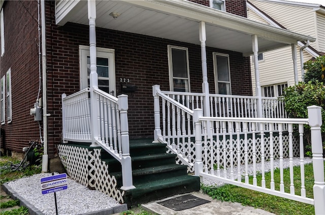 property entrance with a porch