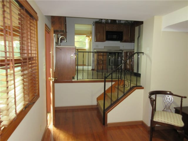 stairway with wood-type flooring