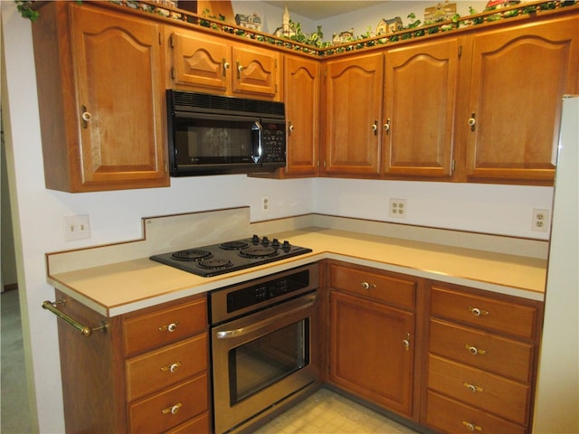 kitchen with black appliances