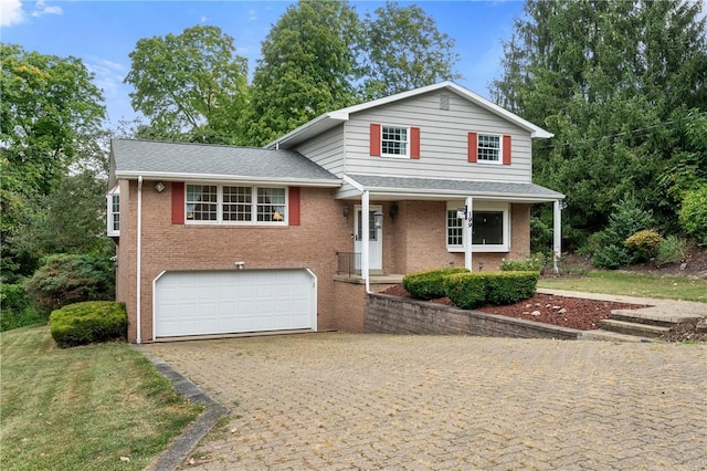 view of front of house with a garage