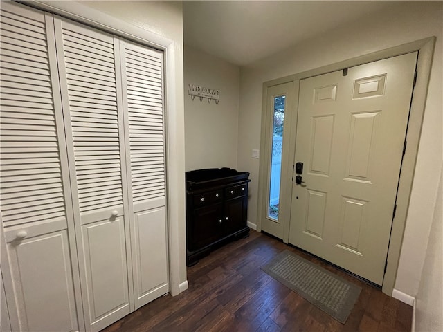 foyer entrance featuring dark hardwood / wood-style floors