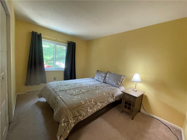 bedroom featuring carpet flooring