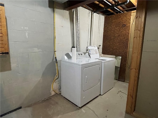 laundry area with washer and clothes dryer