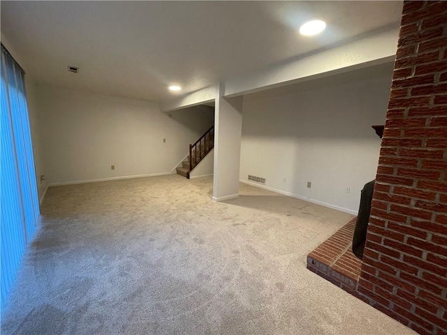 basement with light colored carpet