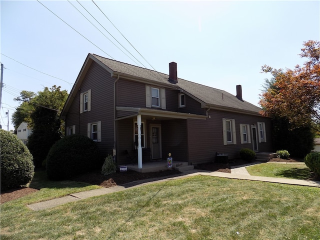 view of front facade featuring a front yard