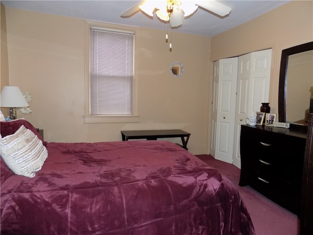 bedroom featuring carpet, ceiling fan, and a closet