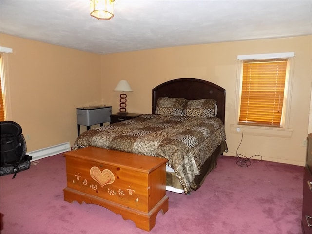 bedroom with a baseboard radiator and carpet flooring