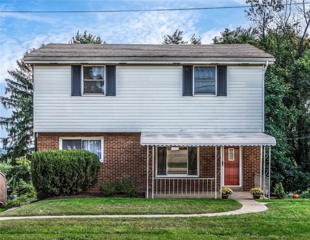 front facade with a front lawn