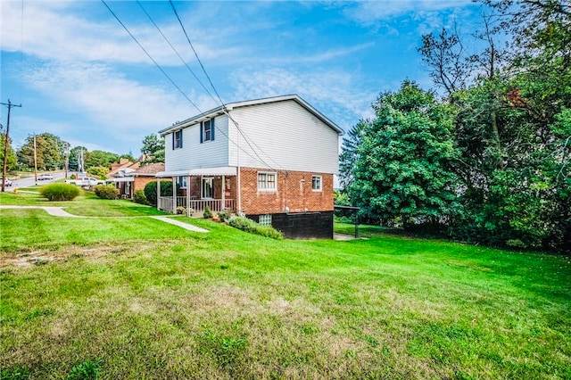 view of property exterior featuring a yard