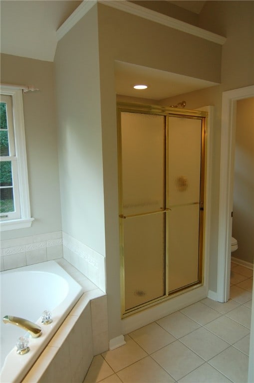 bathroom with shower with separate bathtub, crown molding, toilet, and tile patterned floors