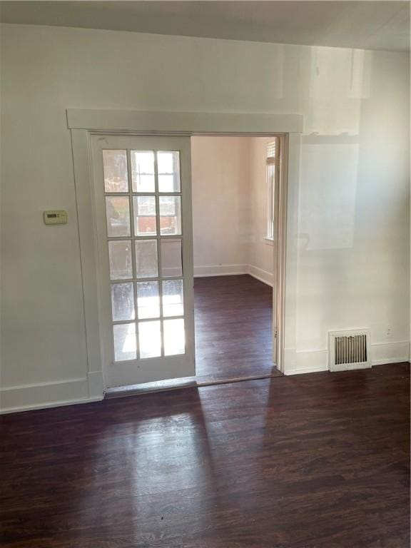 623 Beaver St, Ambridge, PA 15003 - unfurnished room with baseboards and dark wood-type flooring