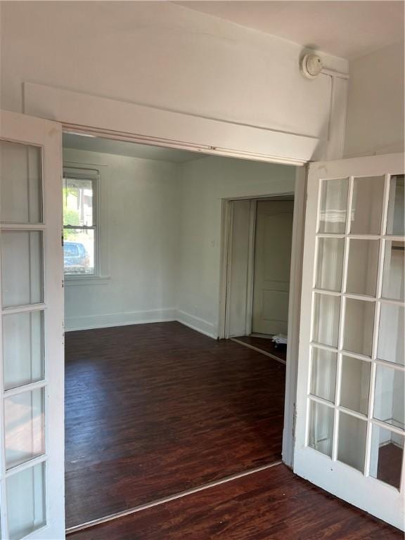 623 Beaver St, Ambridge, PA 15003 - empty room with wood finished floors, a smoke detector, and baseboards