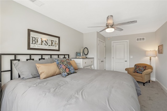 carpeted bedroom featuring ceiling fan