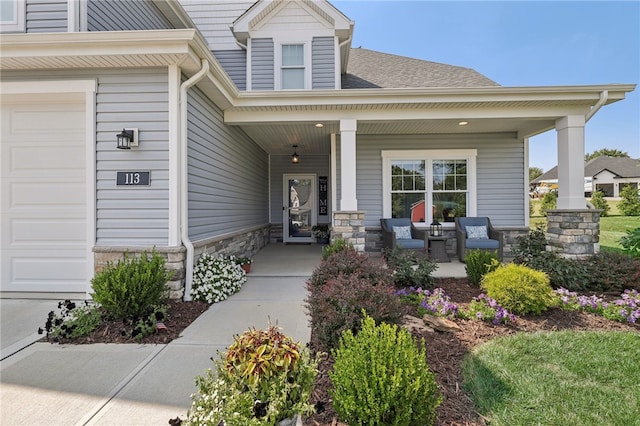 entrance to property featuring a porch