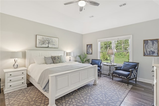 bedroom with hardwood / wood-style floors and ceiling fan