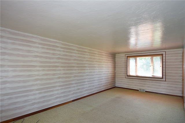 empty room with carpet floors