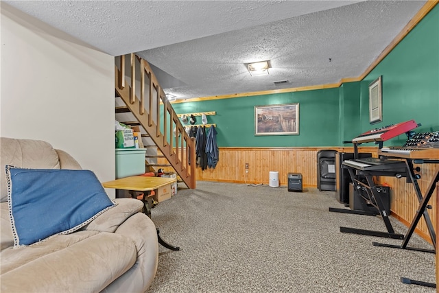 interior space featuring a textured ceiling and carpet floors