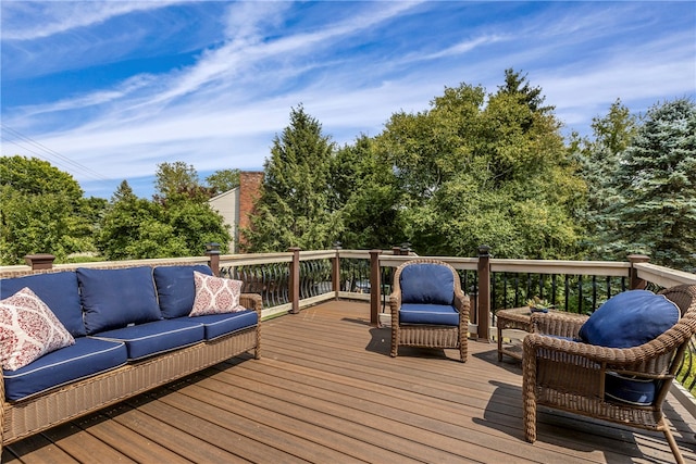 deck featuring outdoor lounge area