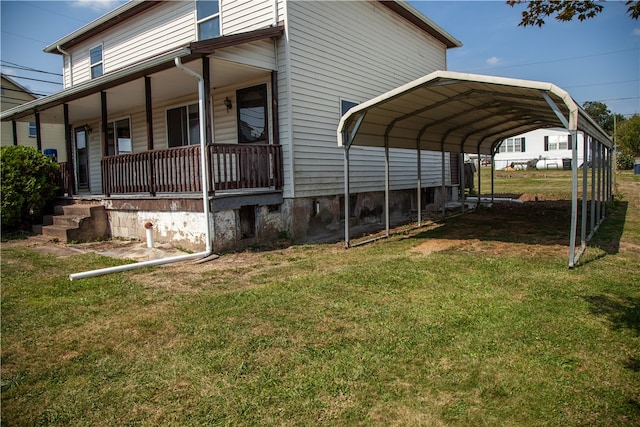 exterior space featuring a lawn and a carport