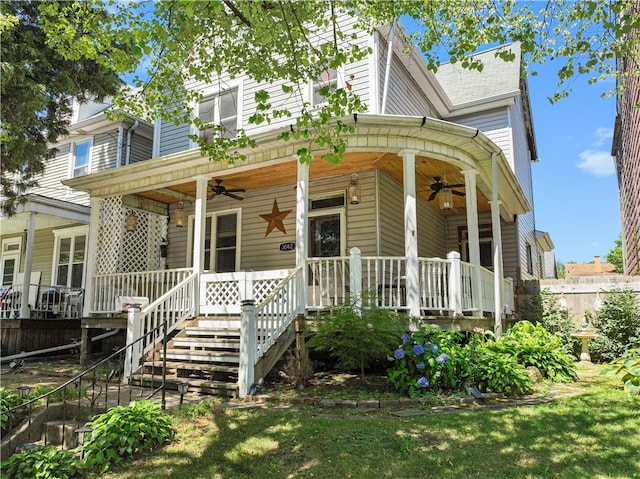 view of front of house featuring ceiling fan and a porch