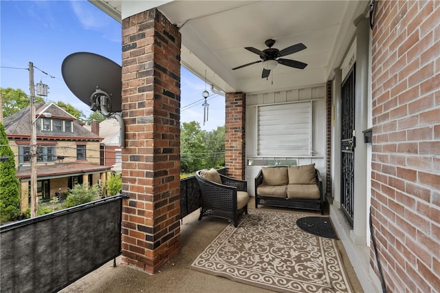 balcony featuring ceiling fan