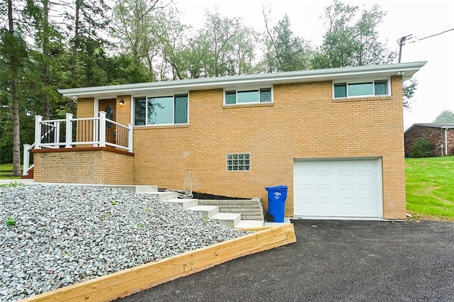 view of front of property featuring a garage