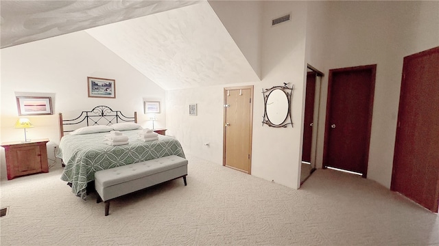 carpeted bedroom featuring vaulted ceiling