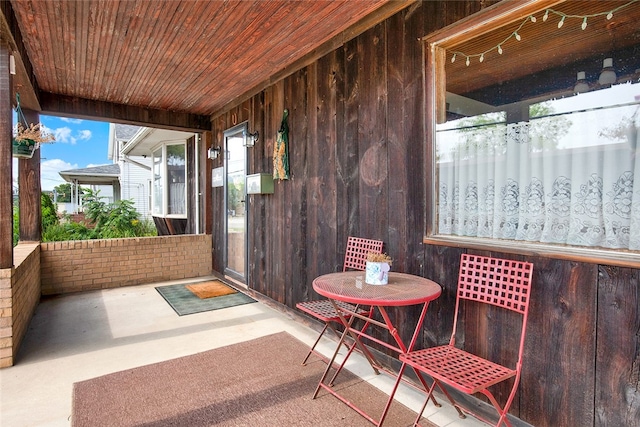 exterior space featuring wood ceiling