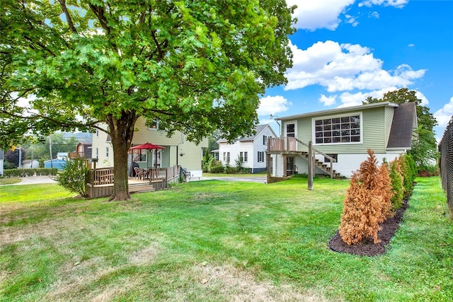 view of yard with a deck