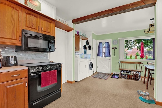 kitchen with light carpet, independent washer and dryer, tasteful backsplash, and black appliances